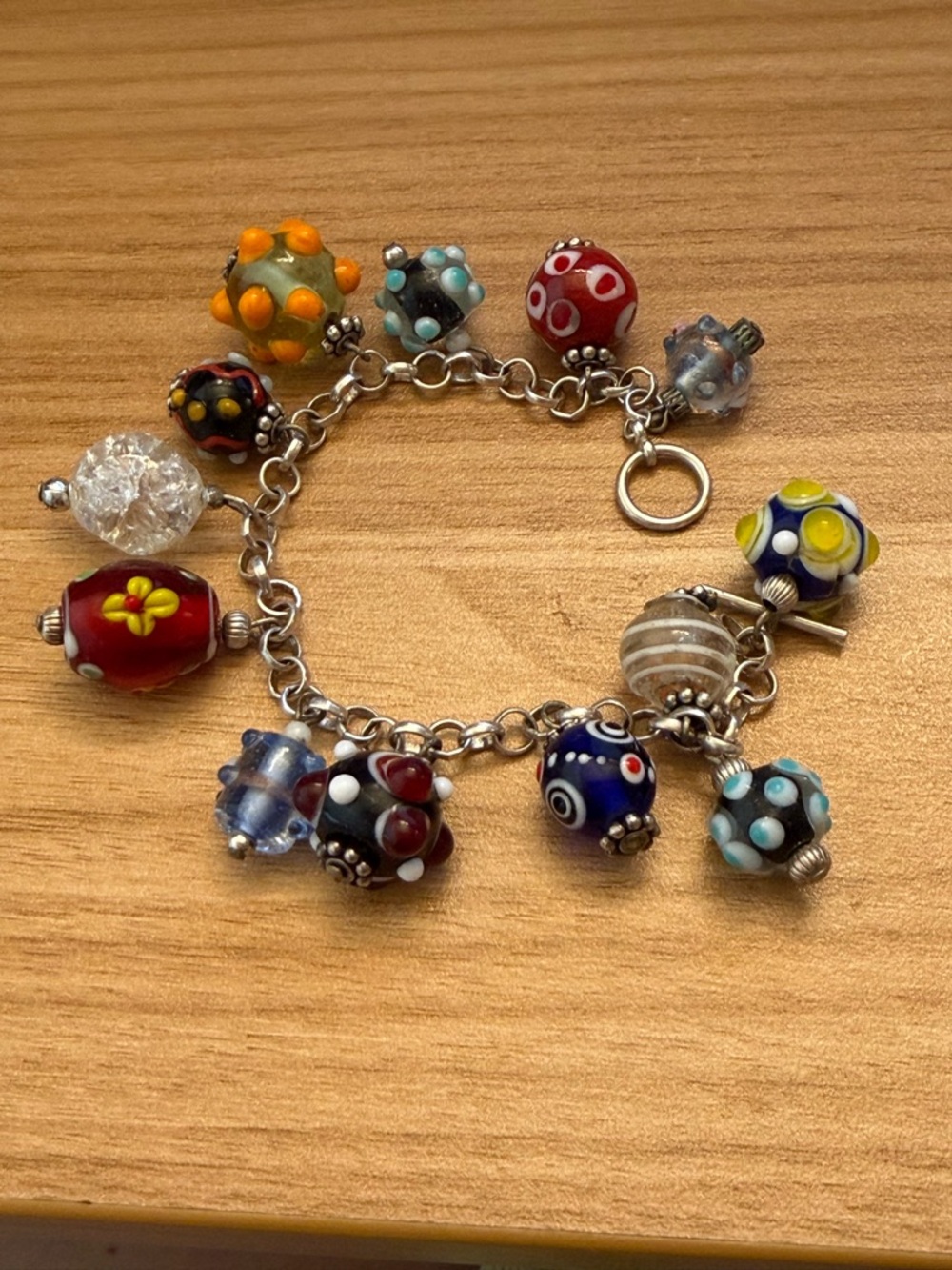 Amazing sterling silver art glass charm bracelet